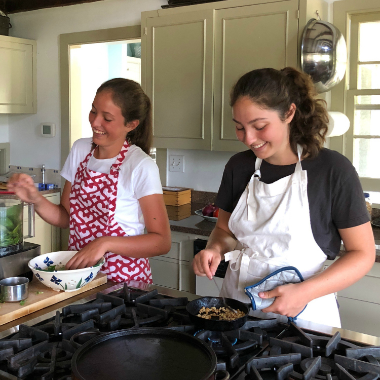 sisters cooking together