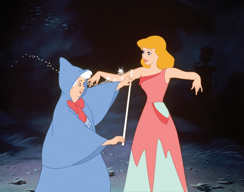 fairy godmother measuring cinderella for her gown