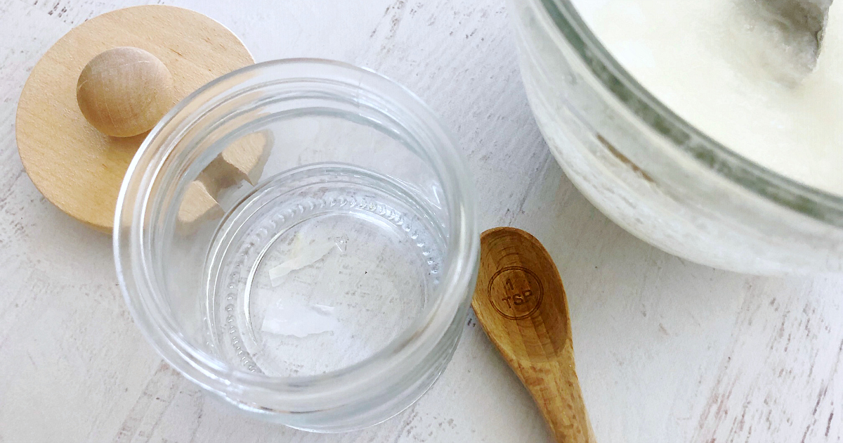 empty mason jar and wood teaspoon
