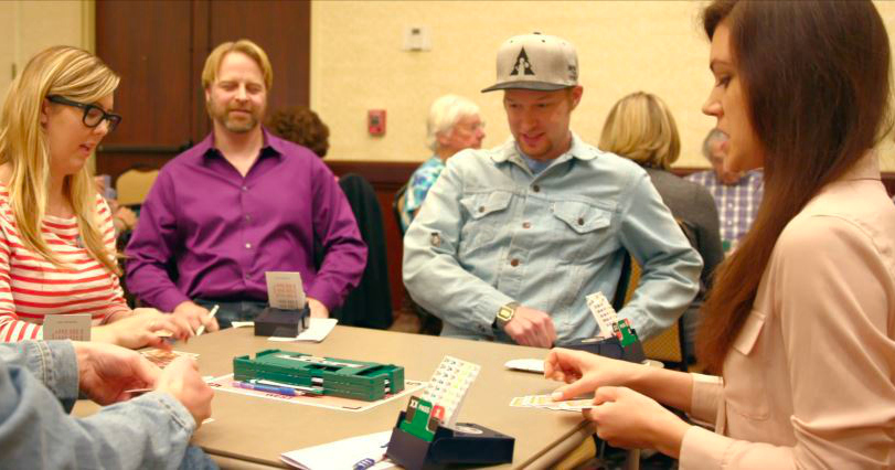 group of people playing bridge