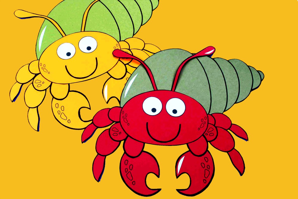 two hermit crab crafts in different colors