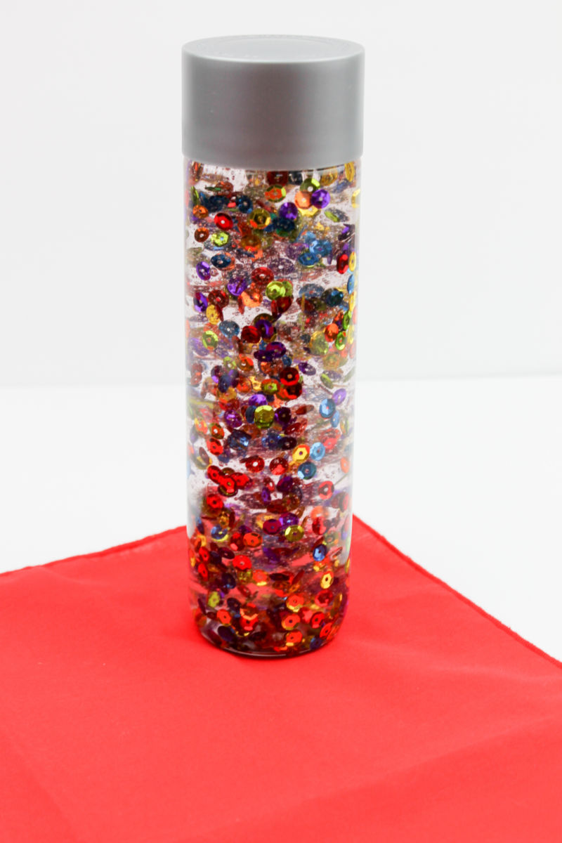 Rainbow Sensory Bottle Craft #SensoryBottle #RainbowSensoryBottle #CalmDownJar #RainbowCalmDownJar #RainbowCraft #SensoryCraft