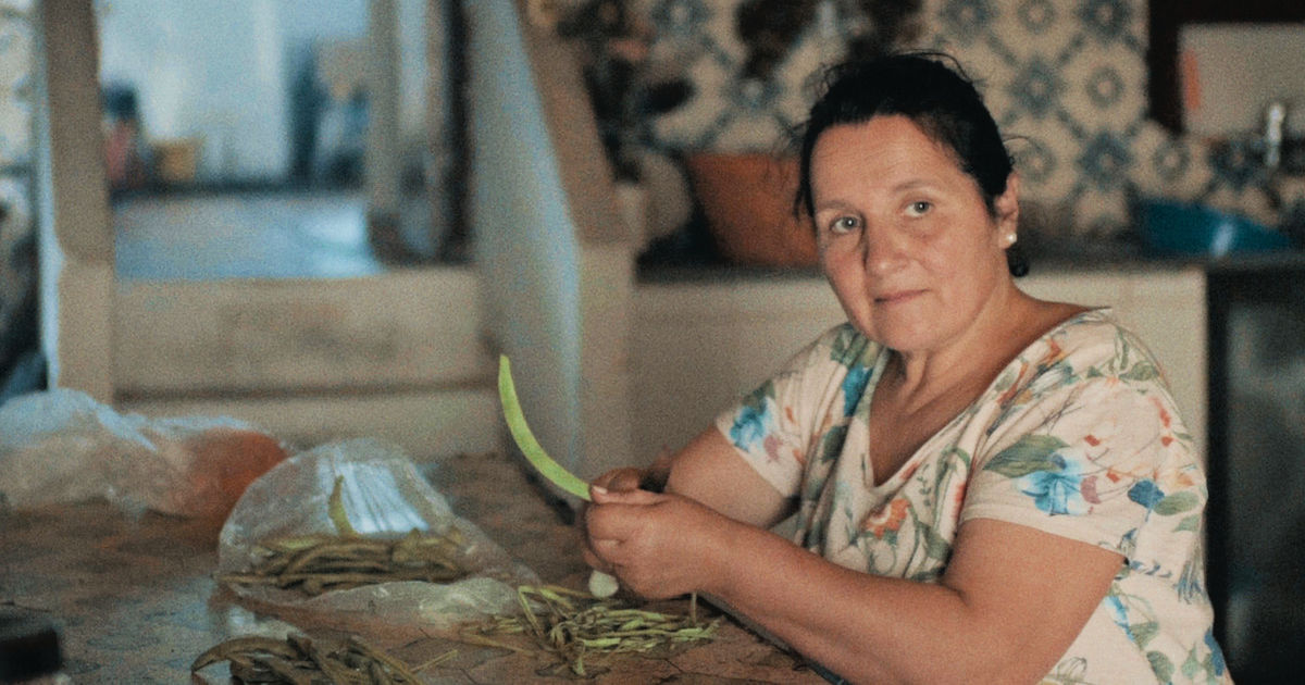 woman working at kitchen table