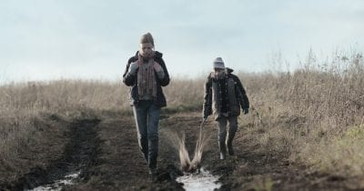brother and sister walking in mellow mud movie