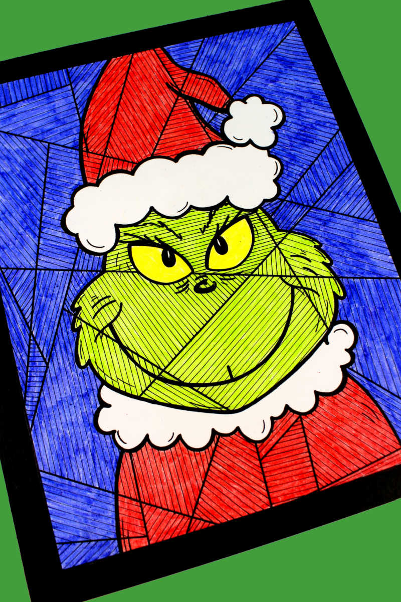 Make your How the Grinch Stole Christmas family night even more fun, when you download my free printable Grinch coloring page.
