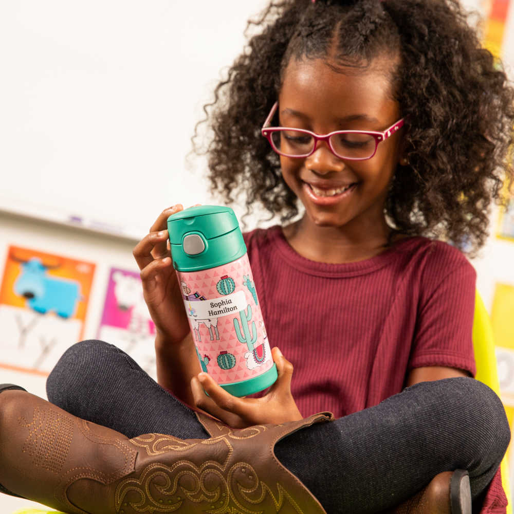 girl at school with reusable water bottle.