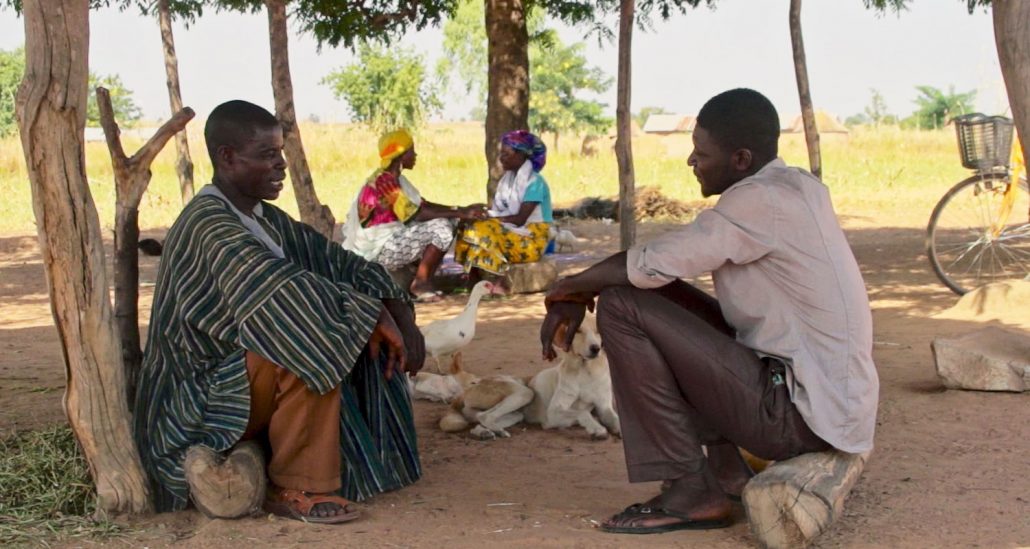 men talking in ghana