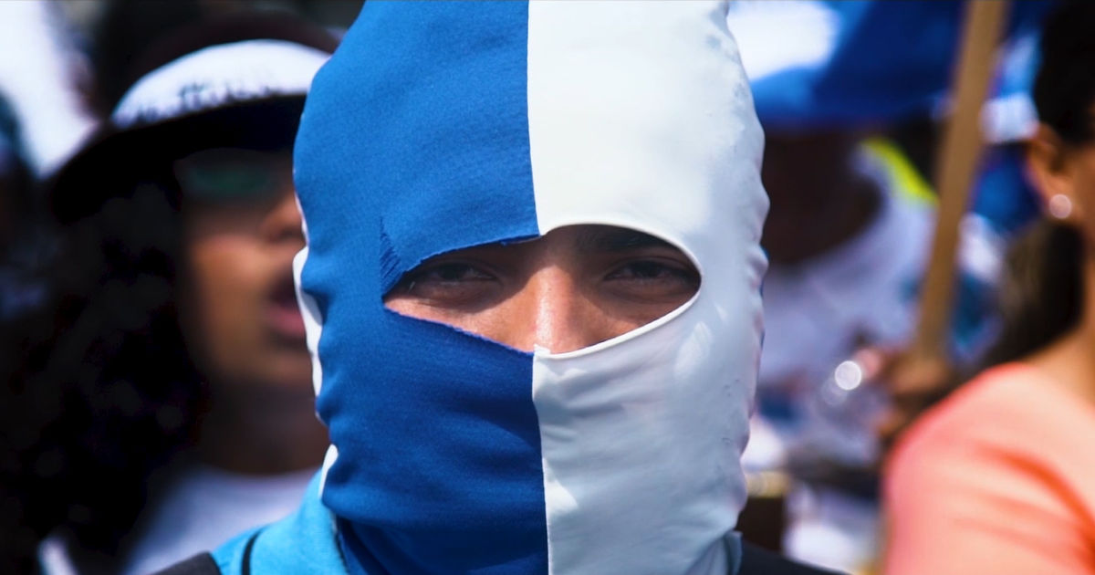 masked man in documentary