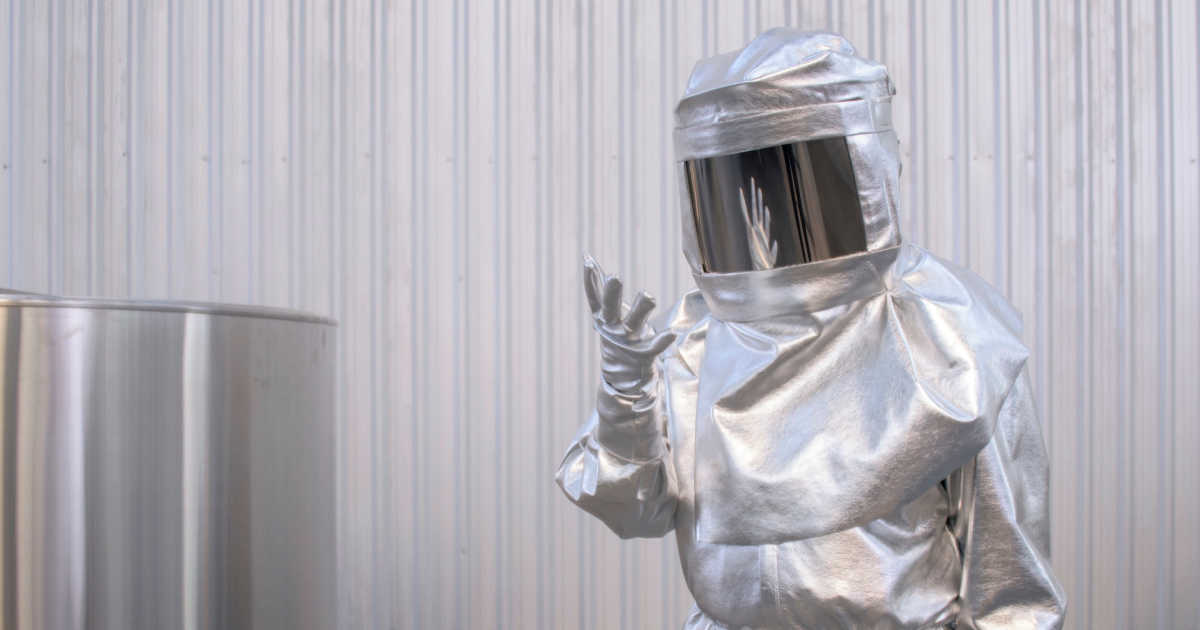 person in silver protective suit