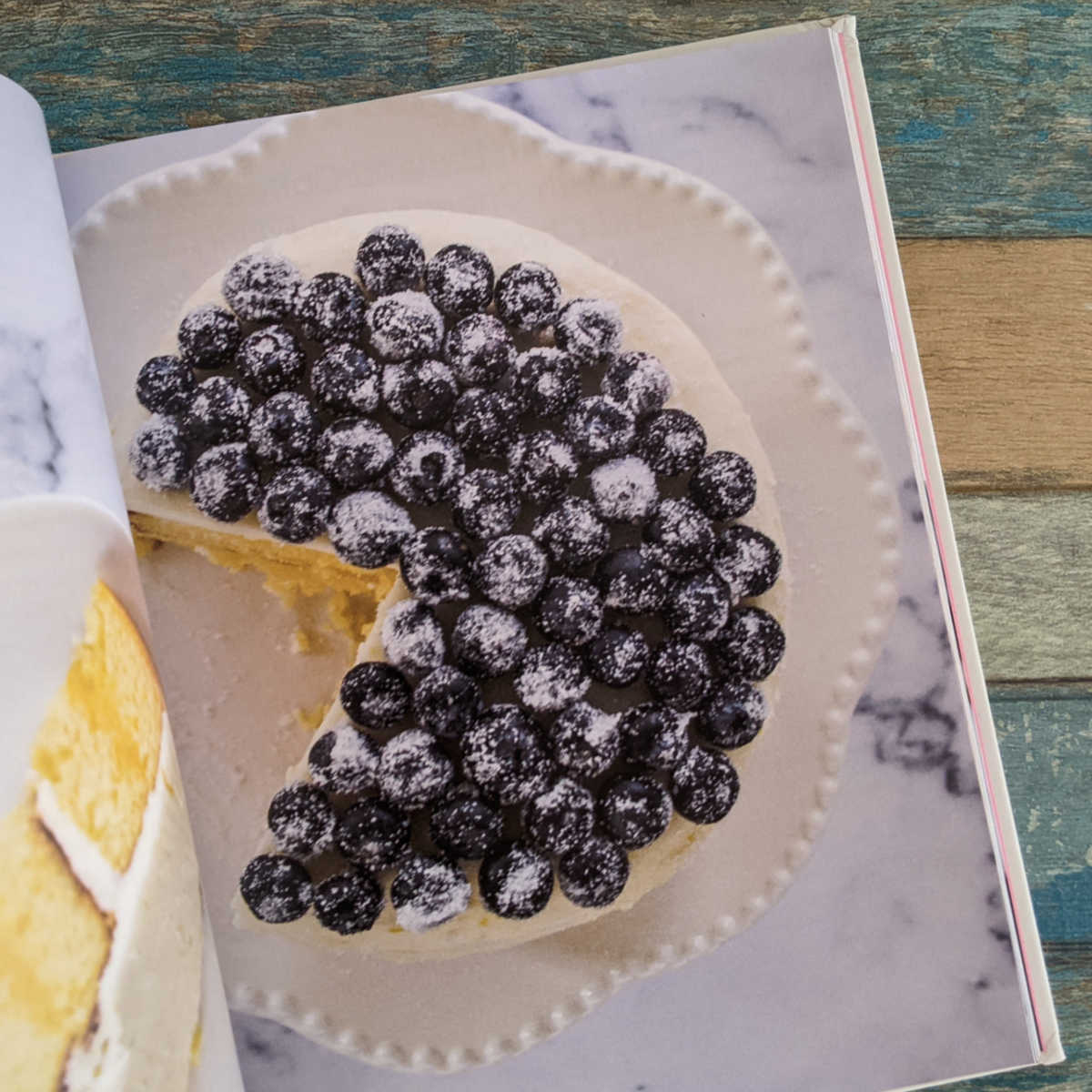 lemon layer cake with sugared blueberries
