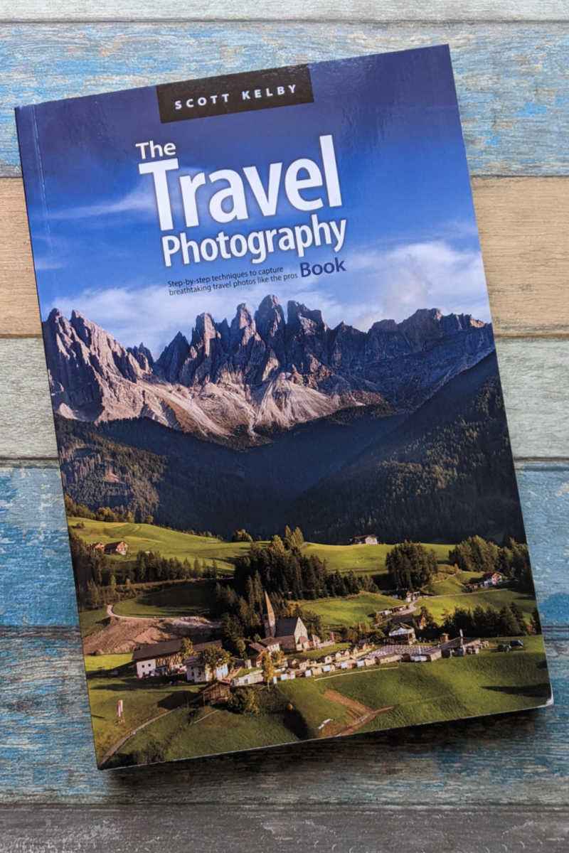 Get The Travel Photography Book by Scott Kelby, so you can improve your photo taking skills and take amazing photographs. 