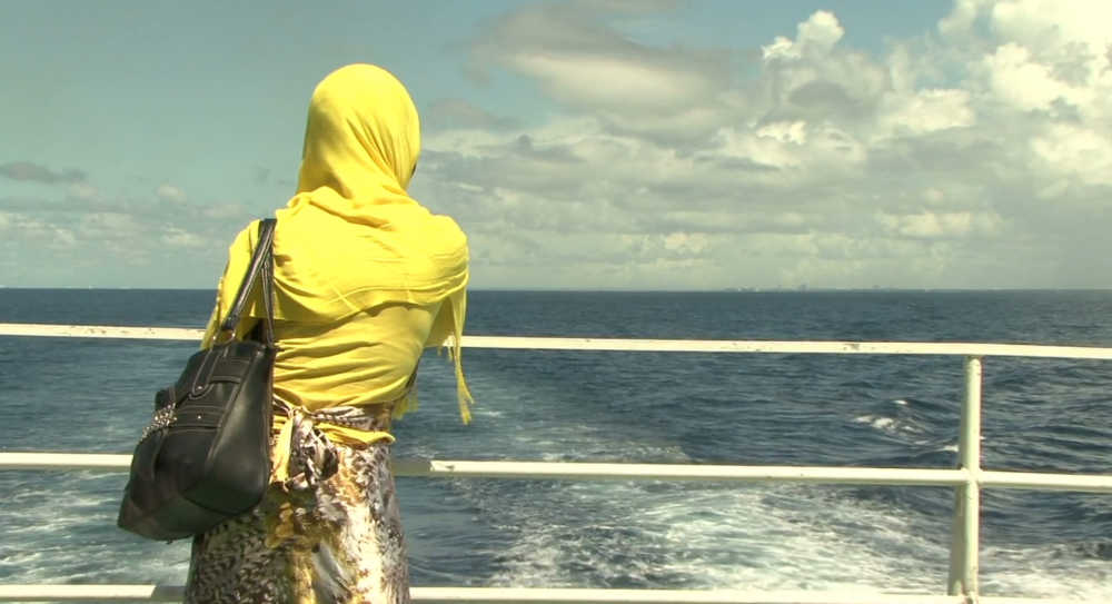 samiras dream poster - woman looking at ocean from back of ship