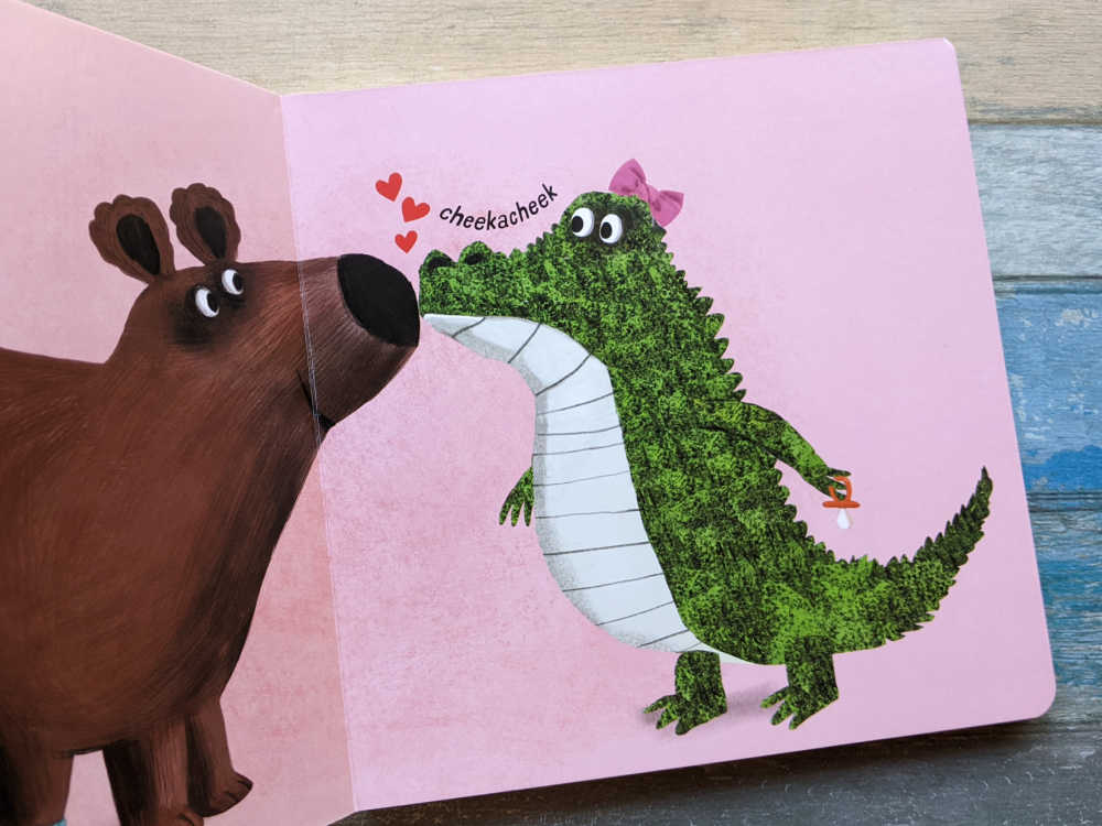 bear kissing a crocodile