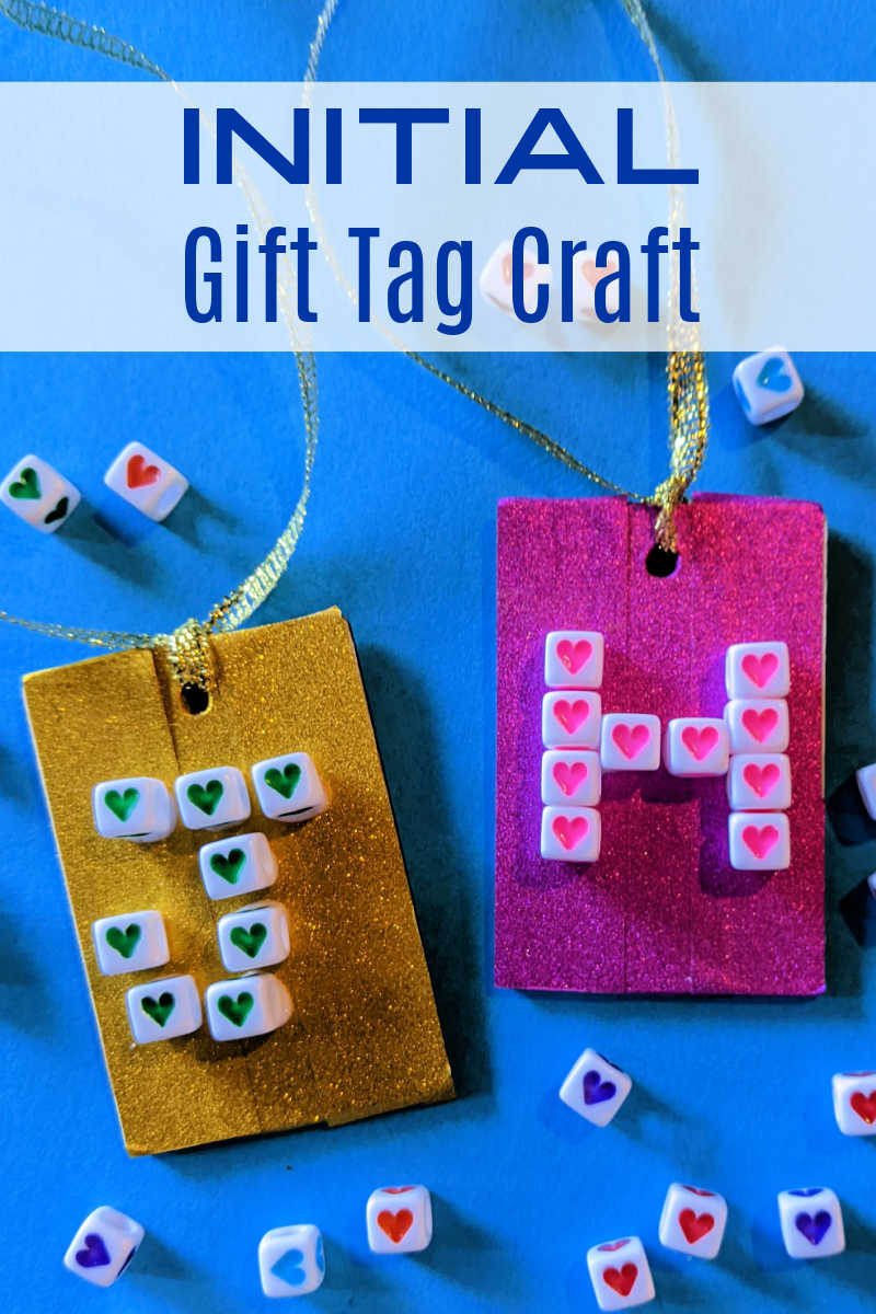 Make the initial gift tag craft with washi tape and beads, so that you can label presents with stylish and festive wood tags. 