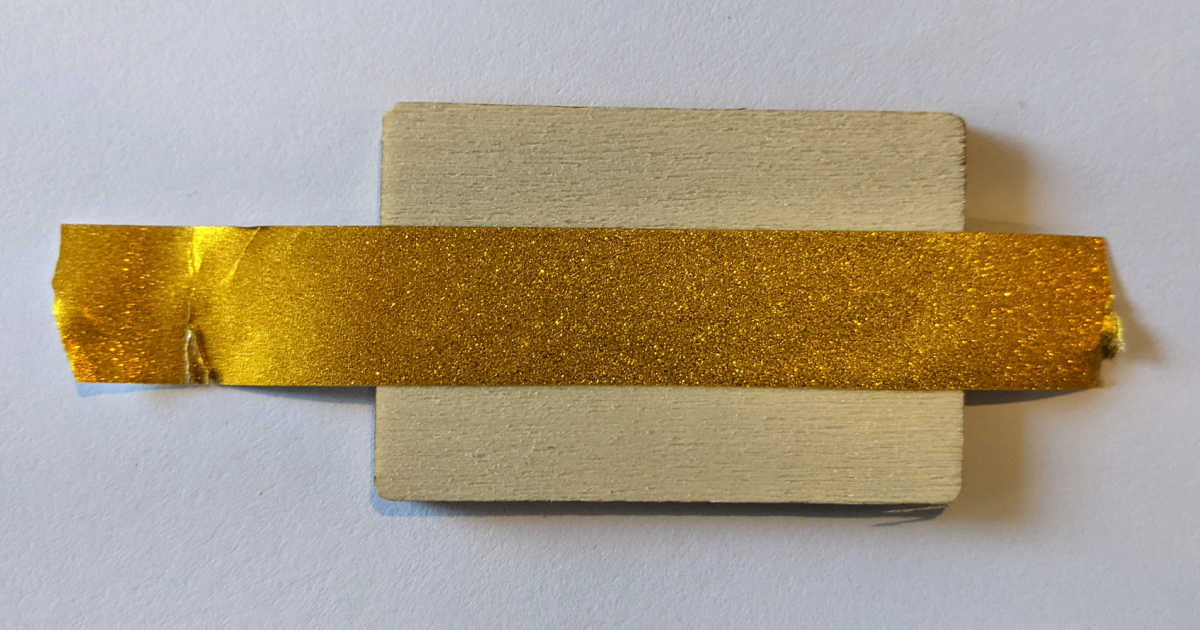 gold washi tape on wood gift tag