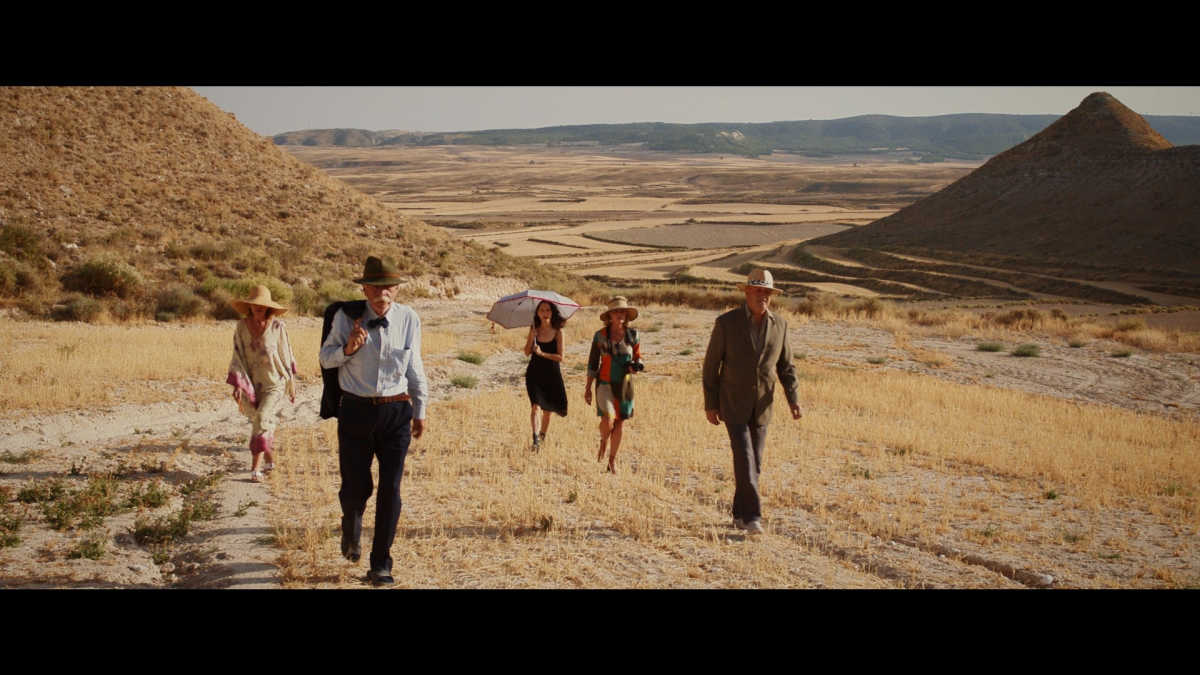 people walking in desert