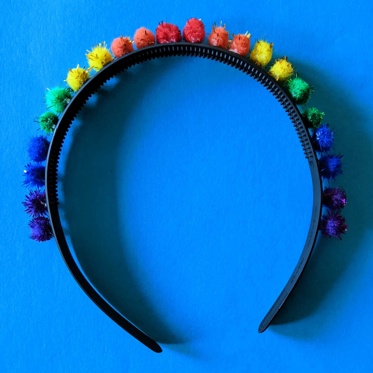 diy rainbow pom pom headband