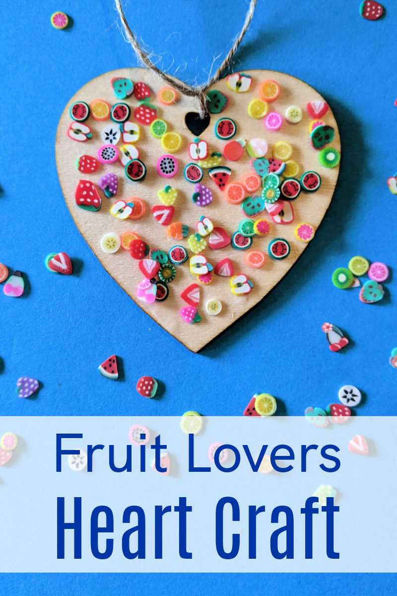 Make an easy fruit lovers heart craft with unfinished wood and little polymer fruit slice confetti in vibrant colors.