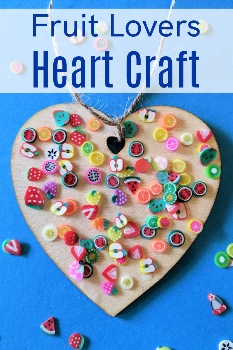 Make an easy fruit lovers heart craft with unfinished wood and little polymer fruit slice confetti in vibrant colors.