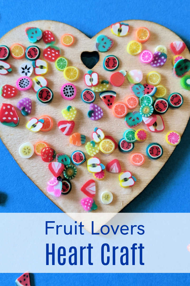 Make an easy fruit lovers heart craft with unfinished wood and little polymer fruit slice confetti in vibrant colors.