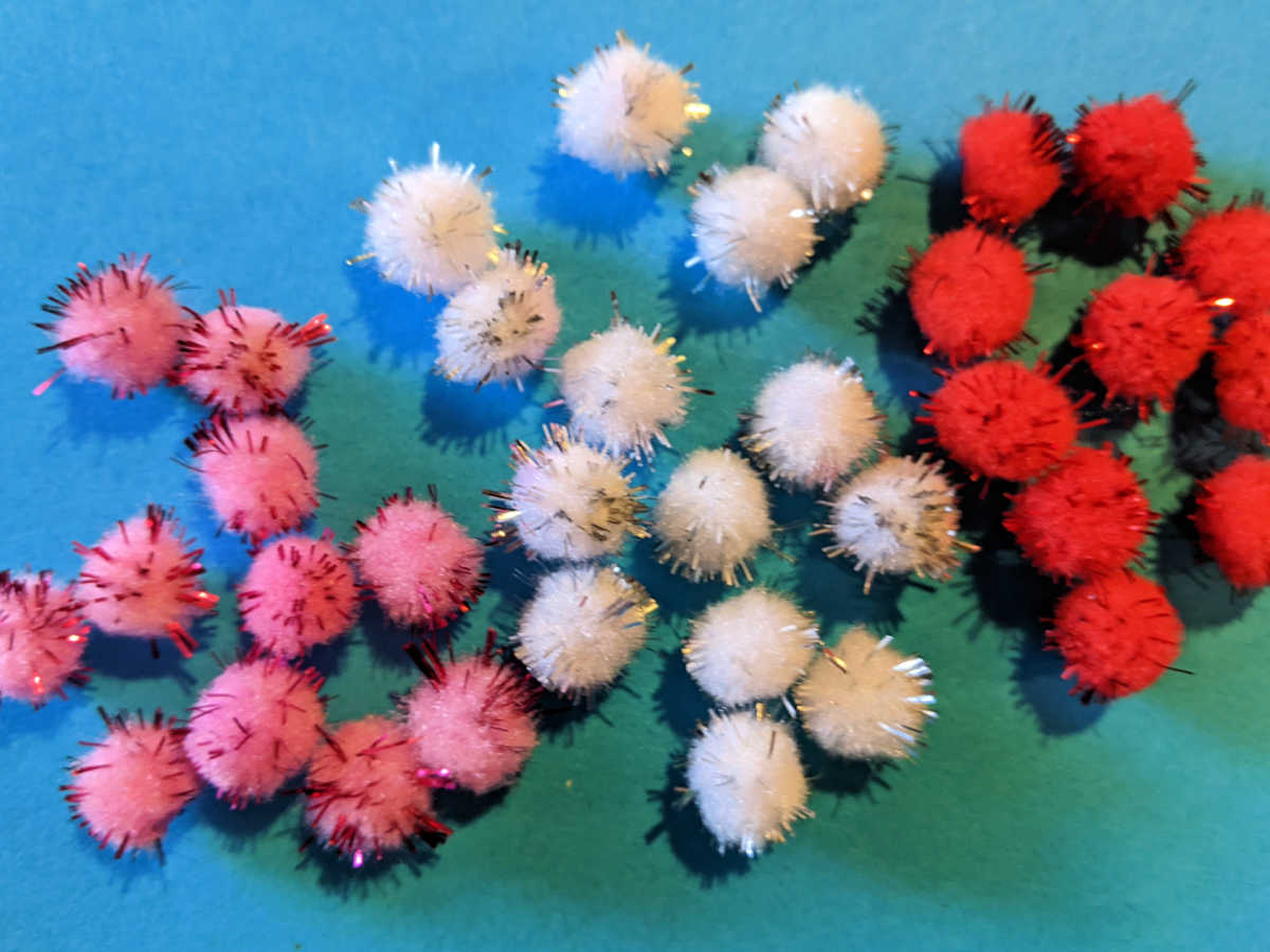 pink white red pom poms