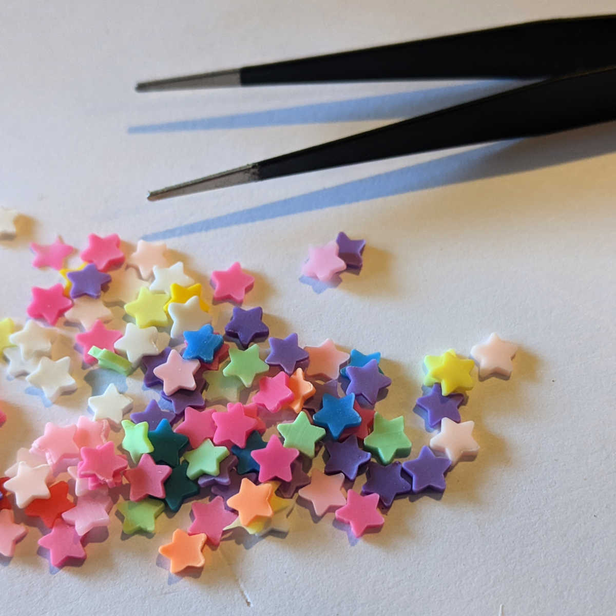 small polymer stars with tweezers