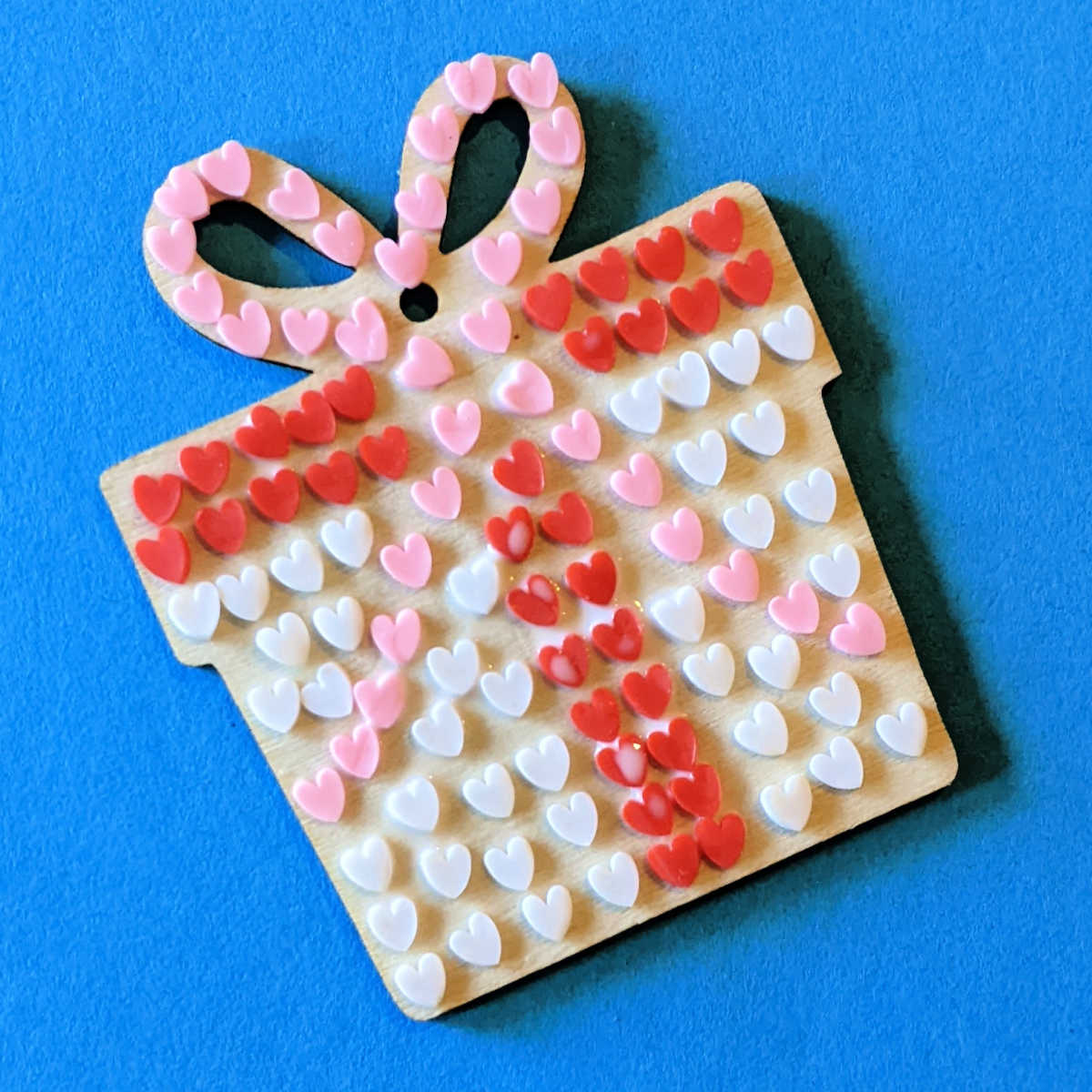making a wood valentine gift tag with polymer hearts
