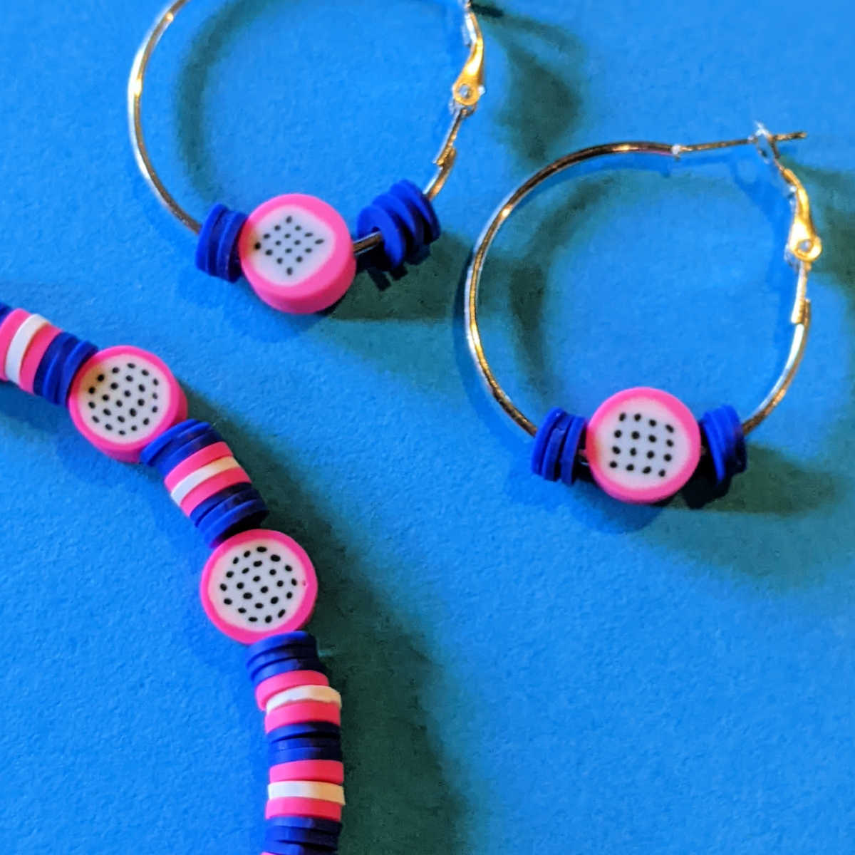 matching dragon fruit earrings and bracelet