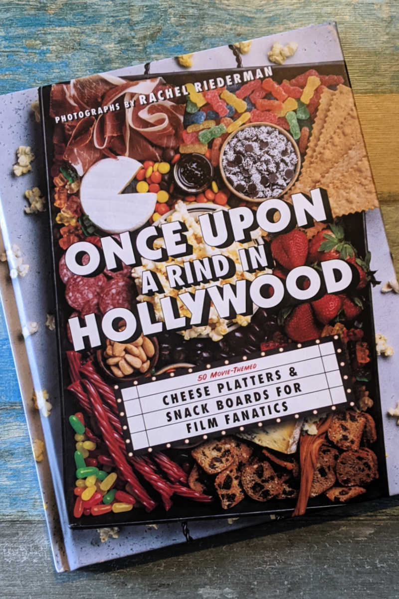 Movie fans and foodies will love the pun-filled Once Upon A Rind in Hollywood cheeseboard and snack board cookbook. 