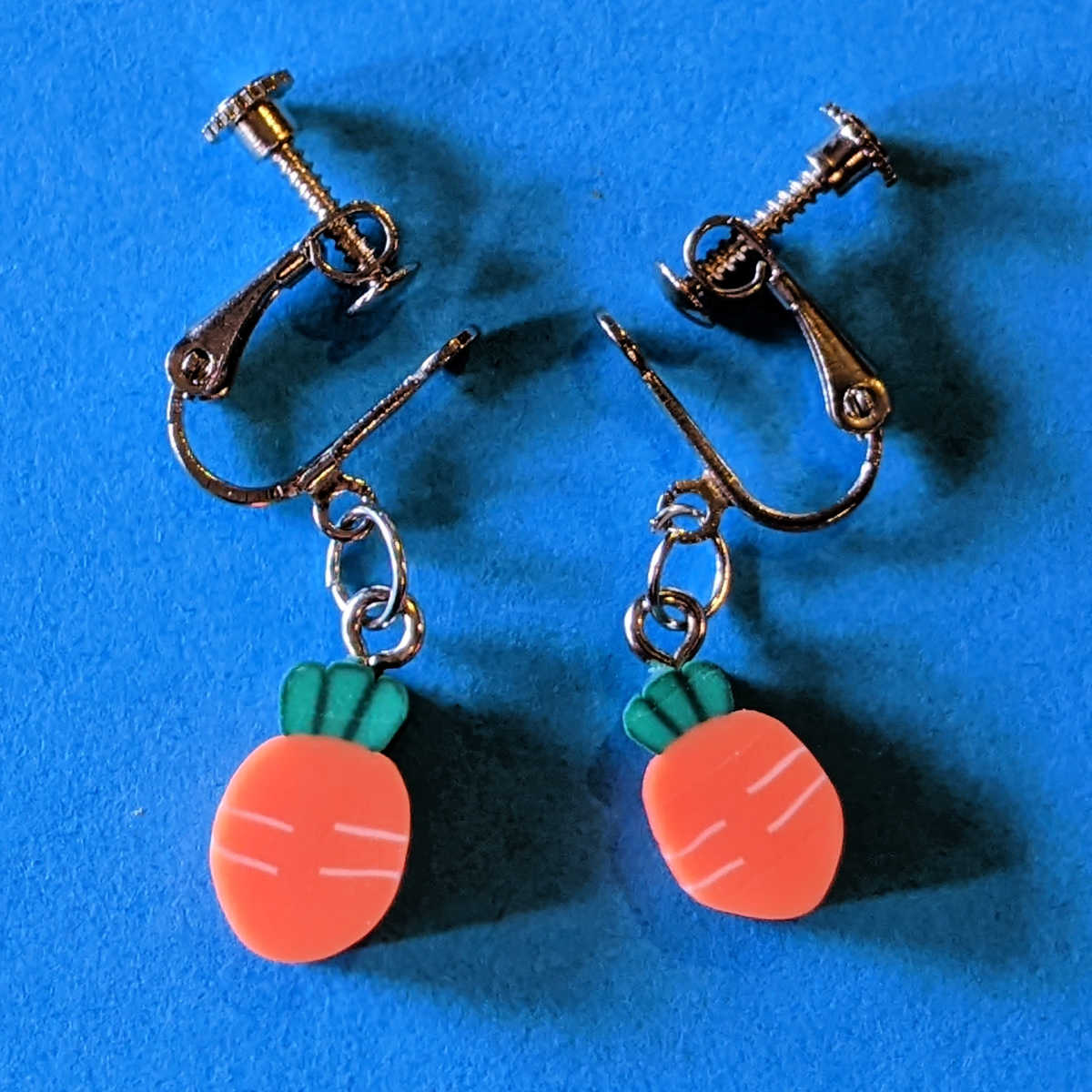 pair of diy clip-on carrot earrings