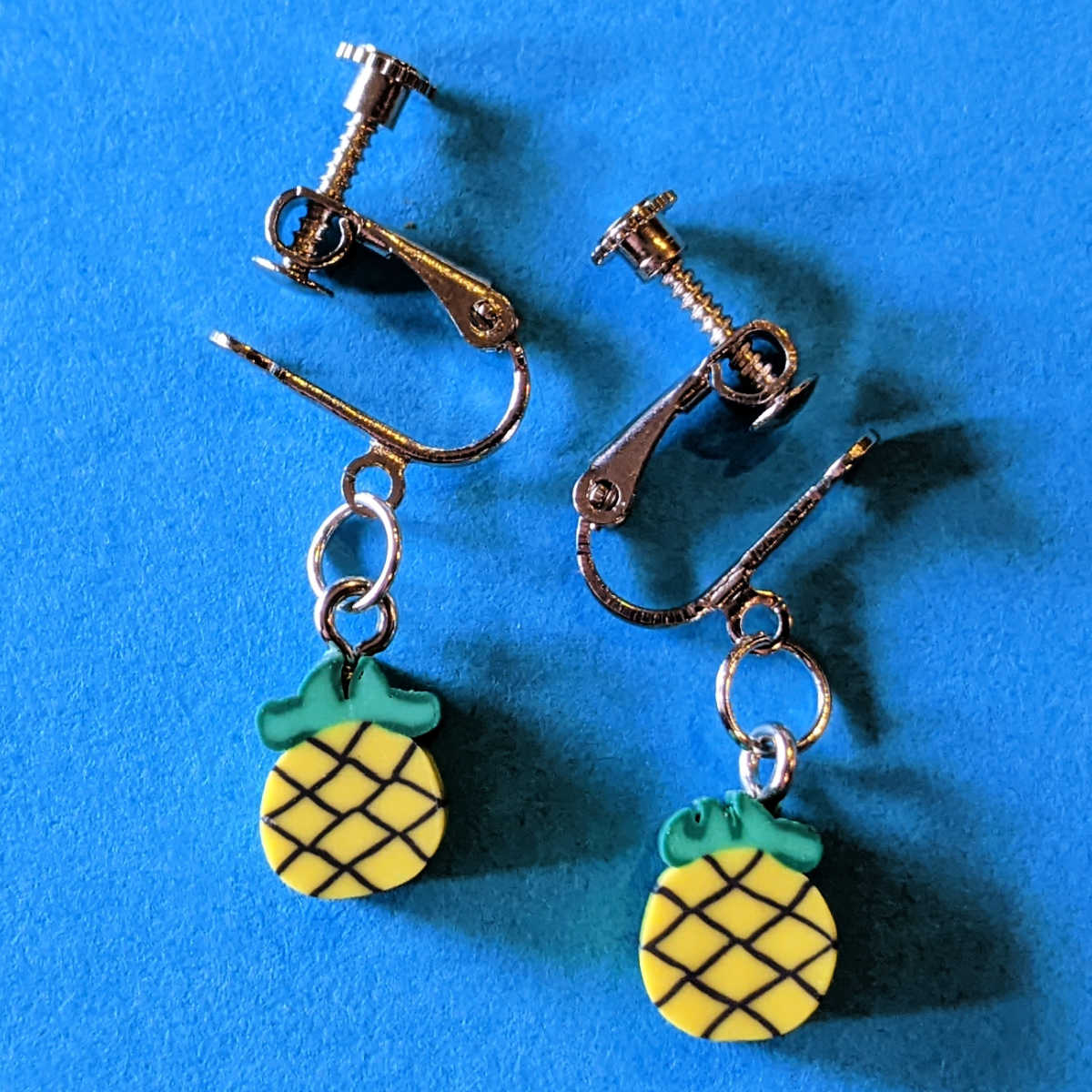 pair of diy pineapple clip-on earrings