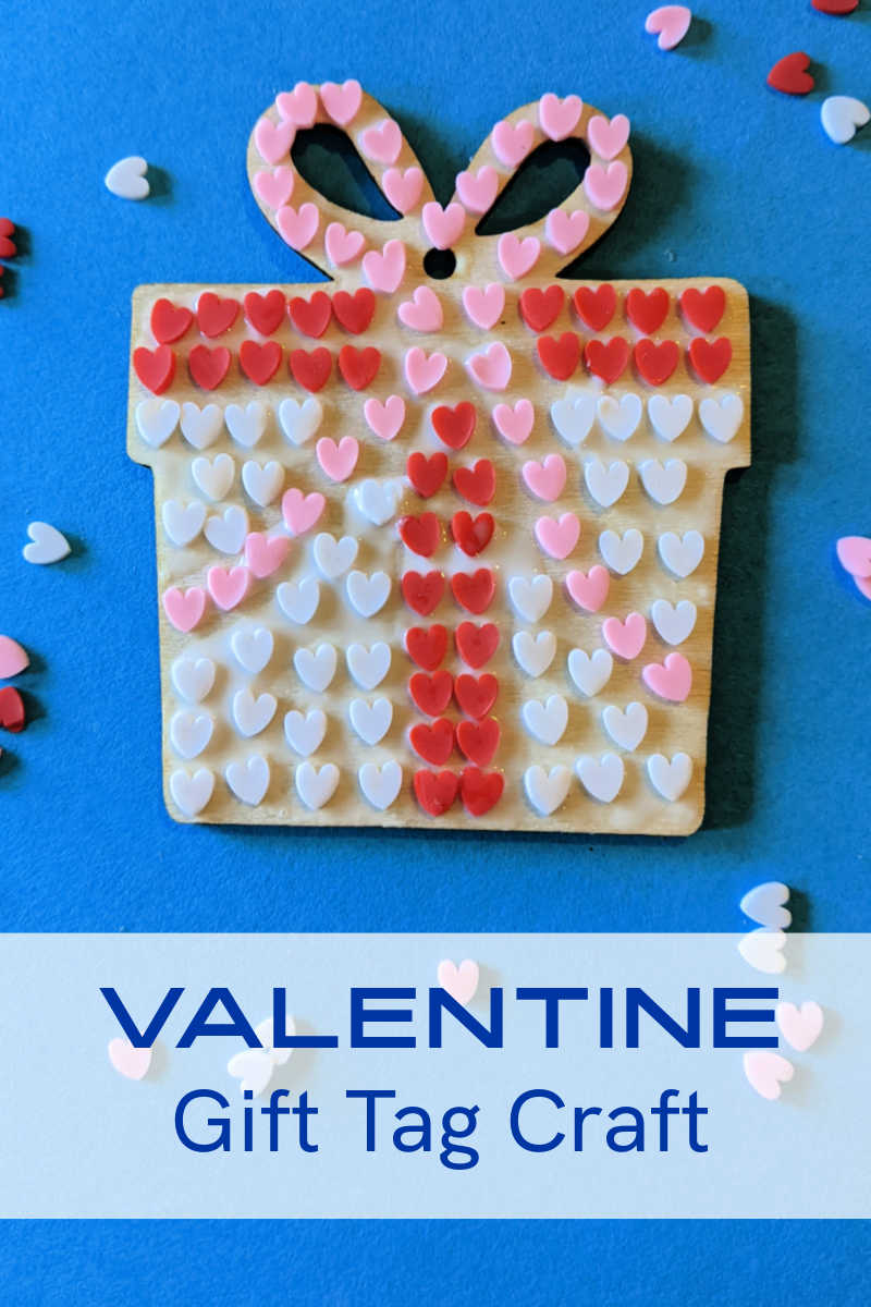 Make this adorable wood Valentine gift tag decorated with red, pink and white polymer heart slices to give to someone special. 