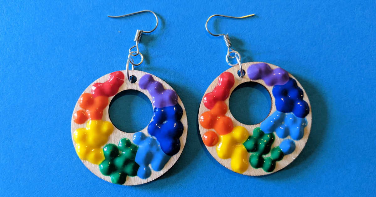 feature rainbow painted earrings