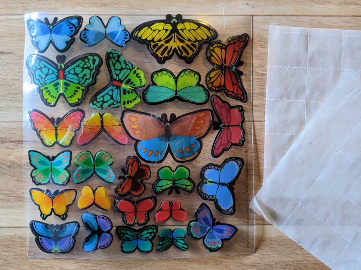 plastic butterflies and glue dots