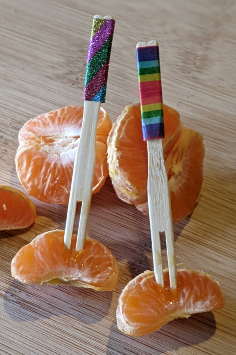Make your next party pop with rainbow washi appetizer forks, which is a fun and easy craft for kids and adults. 