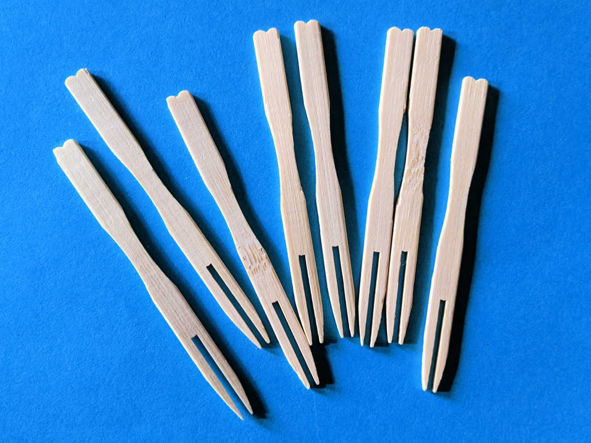 several bamboo appetizer forks