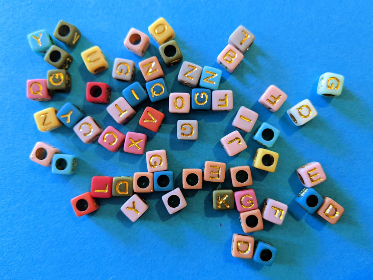 friendship bracelet beads with letters on them