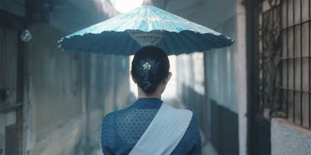 indonesian woman with umbrella