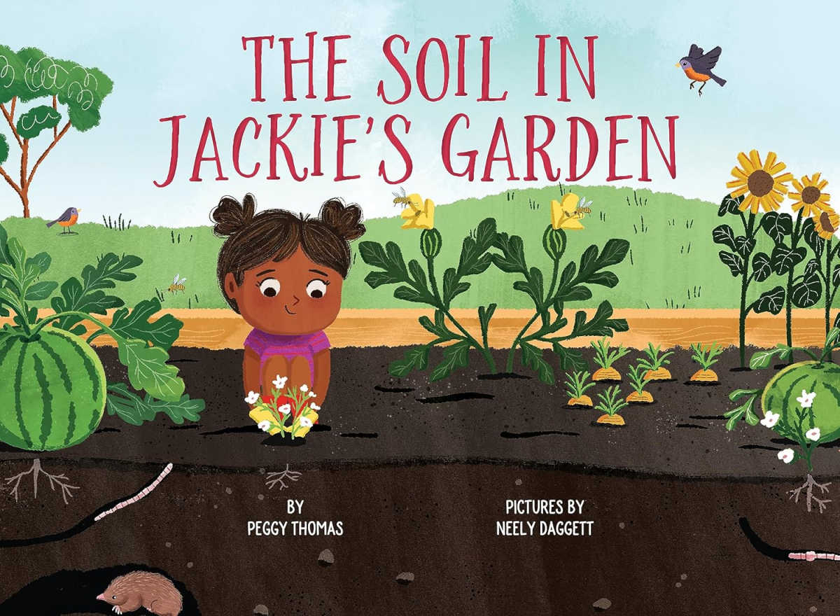 Childrens book the soil in jackies garden