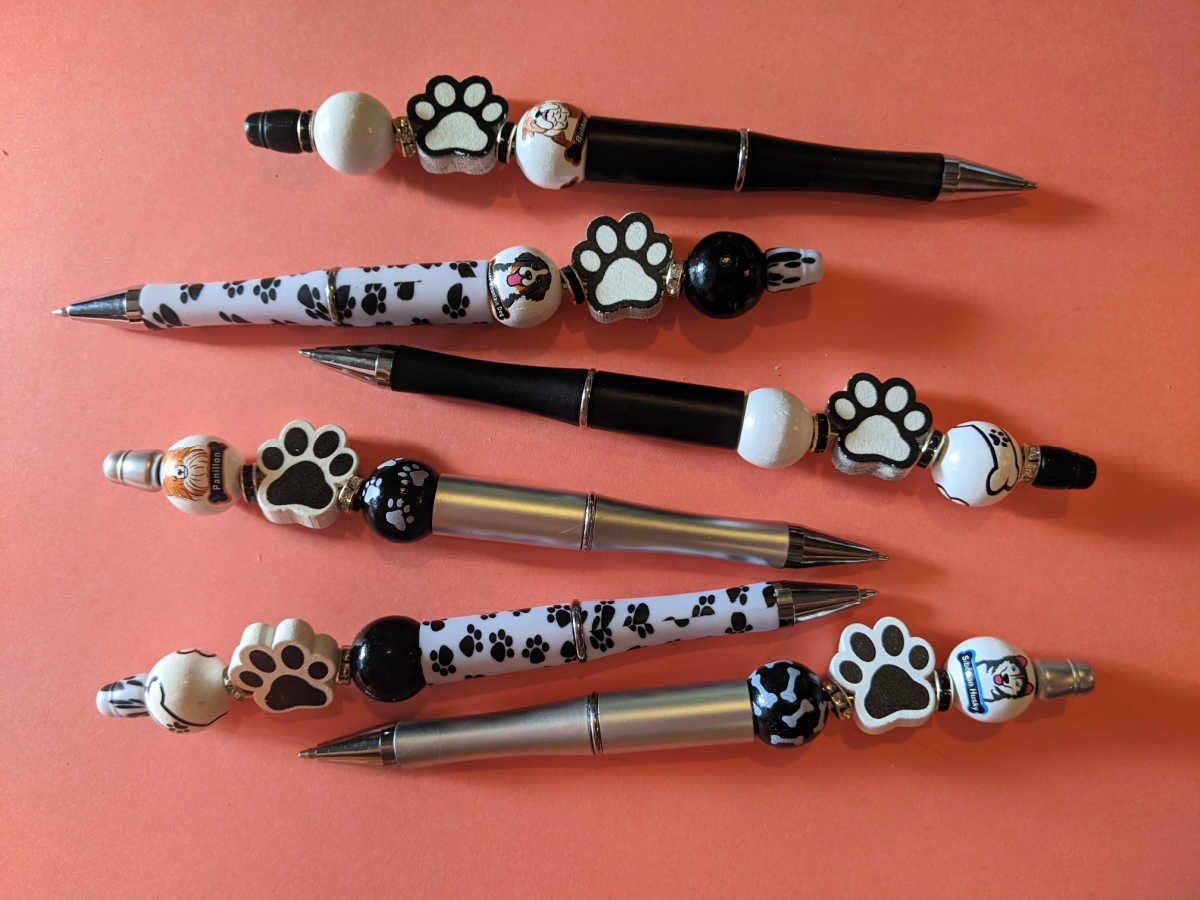 six dog themed beaded pens