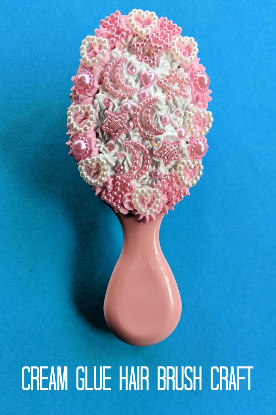 Every princess needs the perfect hair brush, so create your own with this easy and sparkly decoden pink princess hair brush craft! Fun for kids and adults alike, this craft uses whipped cream glue, pearls, and rhinestones to transform an ordinary hair brush into a fit-for-royalty masterpiece! Makes a great gift too!