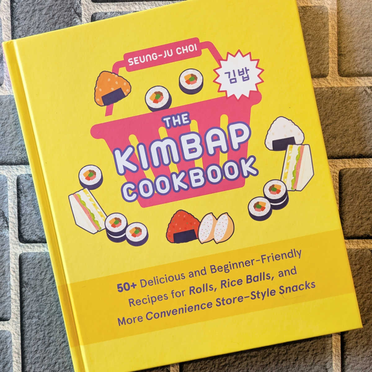 Discover the joy of making authentic Korean snacks like kimbap, rice rolls, and rice balls with The Kimbap Cookbook. This beginner-friendly cookbook offers easy-to-follow recipes and delicious results. The recipes are fun for anyone who loves Korean food or wants to try something new!