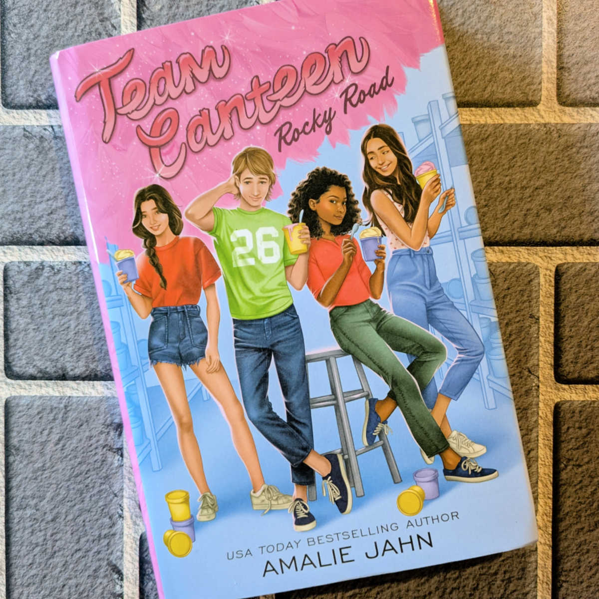 Four camp friends discover a magical pink boa that helps them navigate the challenges of middle school in Team Canteen: Rocky Road. This heartwarming story celebrates the power of friendship and the importance of believing in yourself.