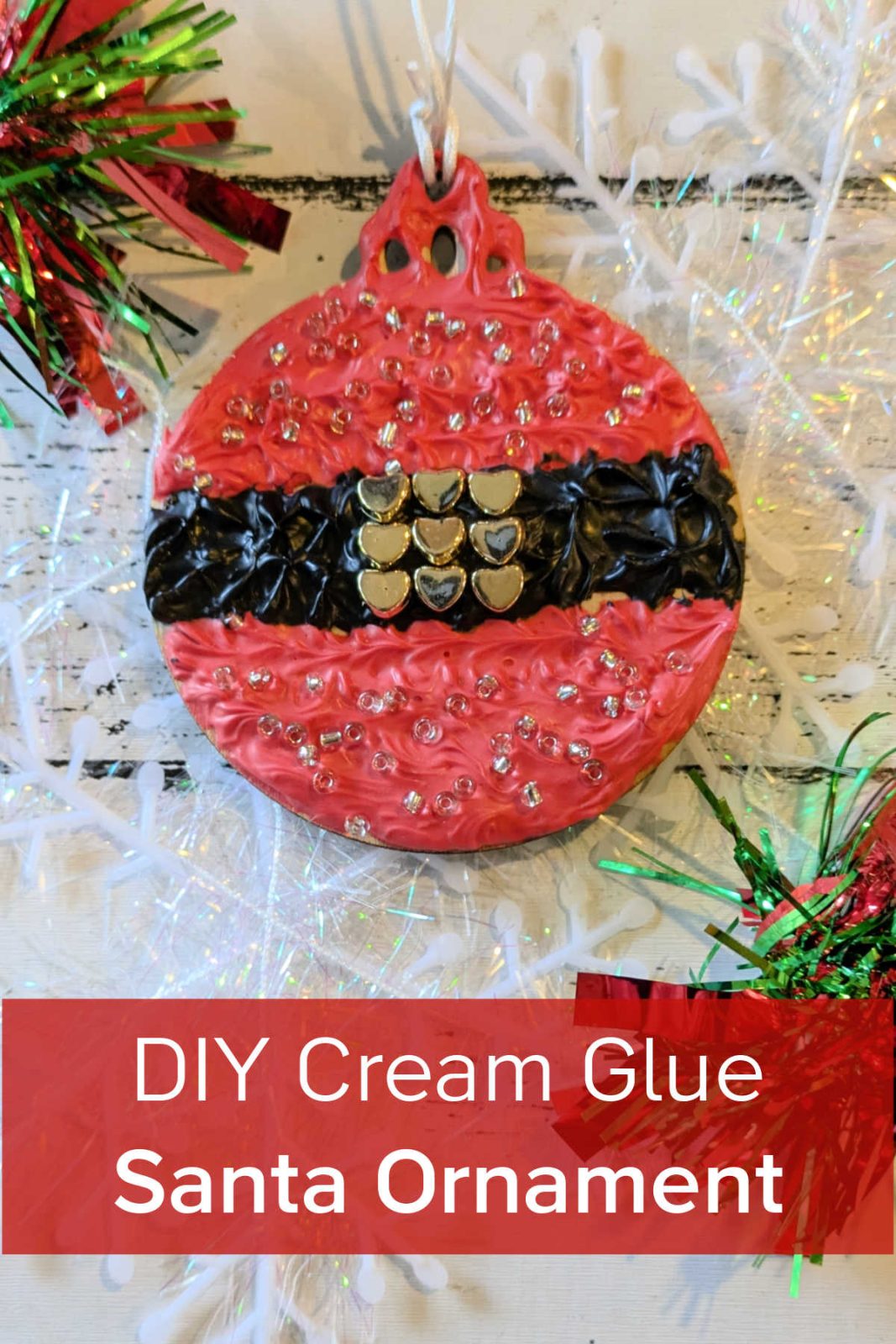 Craft this easy and adorable DIY cream glue Santa ornament and have some festive fun. Let's create whimsical Christmas decor whipped cream glue!