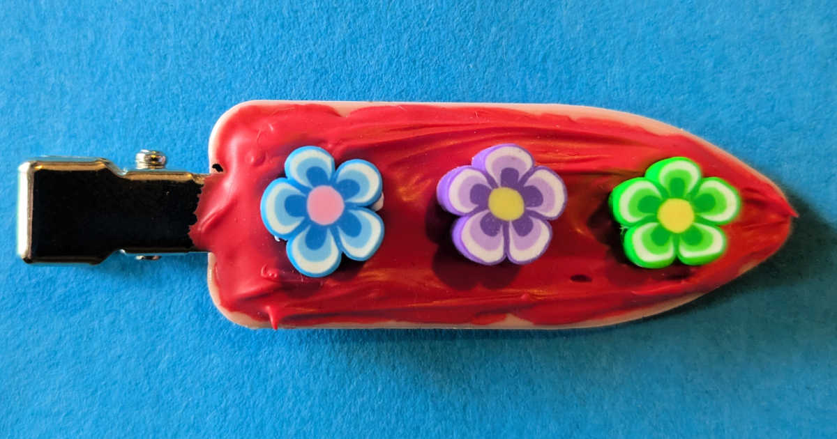 red cream glue hair clip with flowers