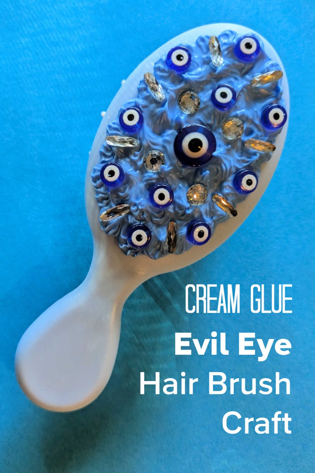 Weave some ancient allure into your hair care ritual with a DIY Evil Eye Hair Brush! This easy and fun craft uses whipped cream glue and eye-catching evil eye embellishments to create a unique and intriguing hair tool.