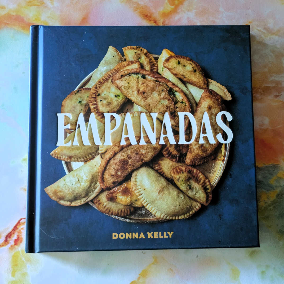 Find your inner chef with Donna Kelly's stunning Empanadas cookbook. With over 70 diverse recipes, beautiful photos, and easy-to-follow instructions, this book is a must-have for both beginners and seasoned cooks.