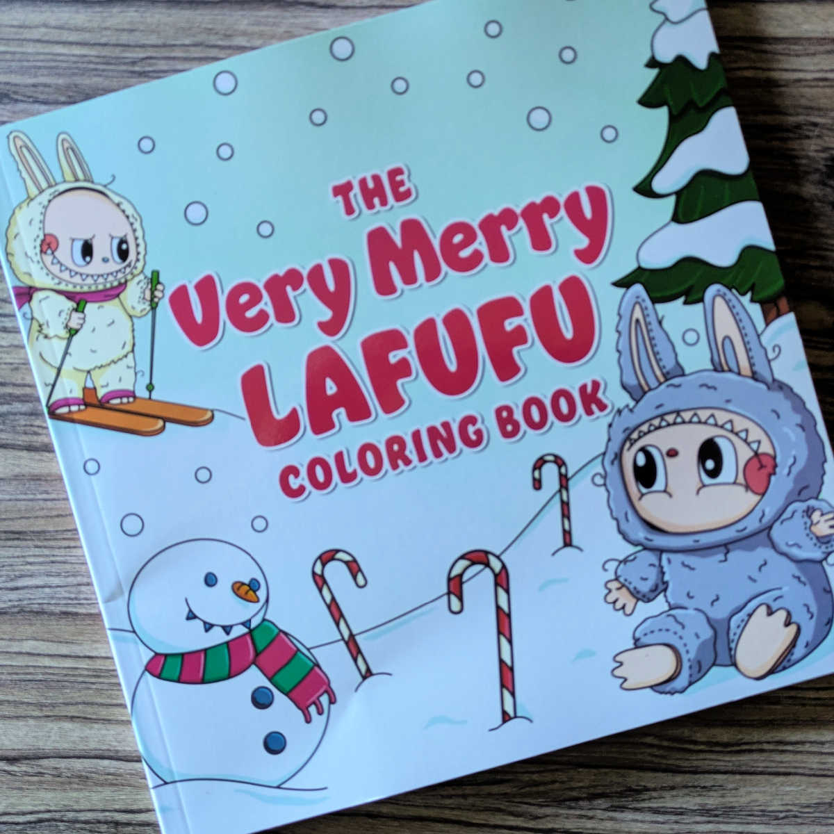 The Very Merry Lafufu Coloring Book is your holiday stress relief! Color funny, creepy-cute Lafufu collectibles wrapping gifts and drinking cocoa. It's the perfect stocking stuffer or gift!