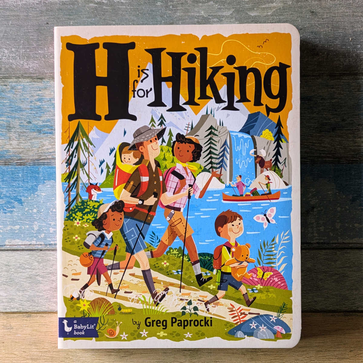 Introduce your little explorer to the wilderness with H is for Hiking! This sturdy, good quality board book features super cute and detailed illustrations that are colorful and engaging for kids. 🥾