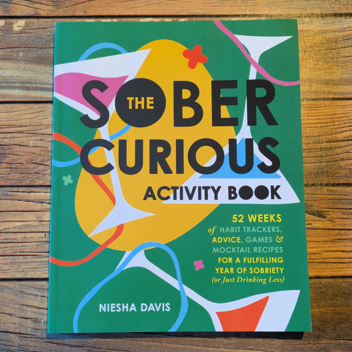 The Sober Curious Activity Book is a good, accessible guide for new year resolutions. Explore sobriety with creative activities and a light, positive approach. Perfect for setting plans!